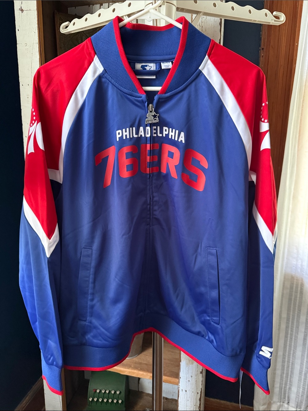 STARTER Women’s Philadelphia 76ERS Blue and Red Varsity Jacket